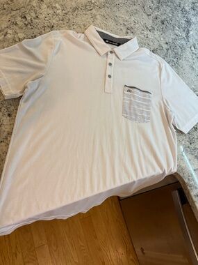 Travis Mathew Men's Pale Pink Polo with Striped Pocket